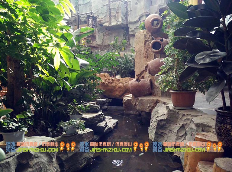 水泥假山圖片.jpg 水泥假山圖片